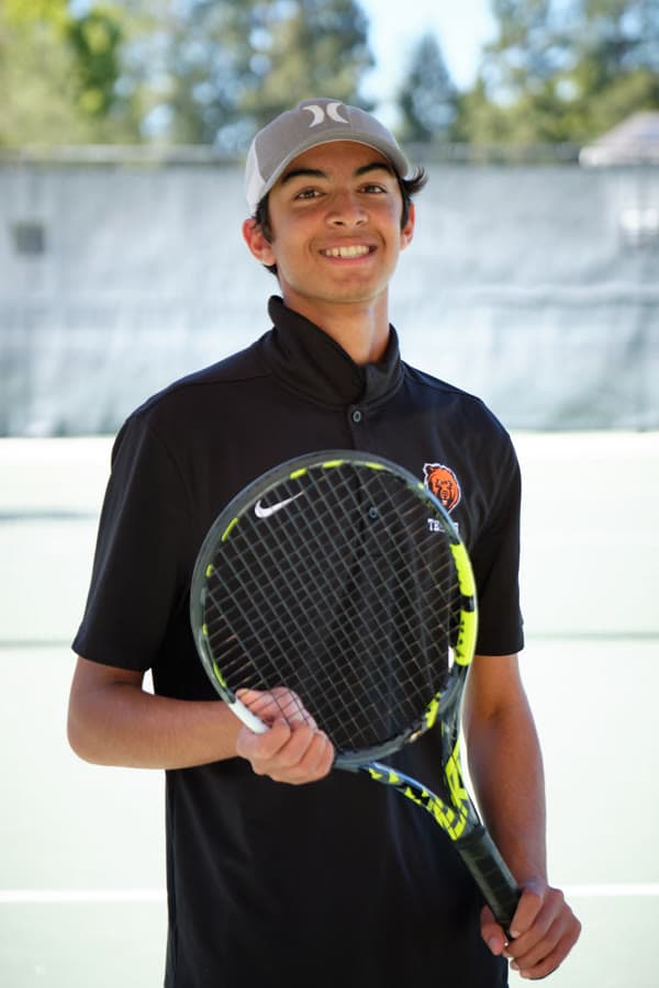 Arjan on the tennis court with his racquet