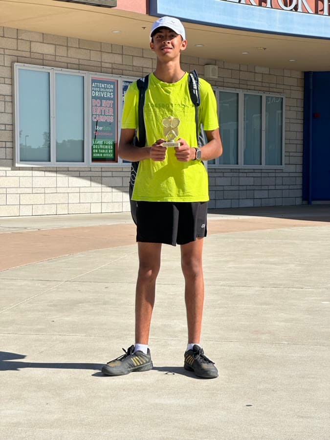 Arjan with a tennis trophy